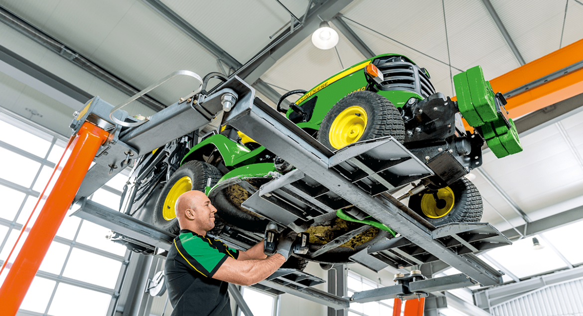 John Deere X900 Series Mower Being Serviced_Featured