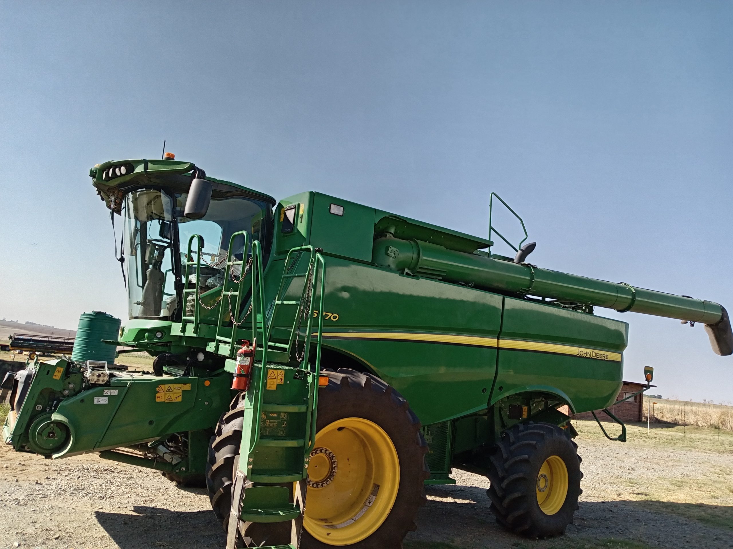John Deere - S770 Combine - For Sale at AFGRI Equipment (Grootvlei) - 3/4 Front View