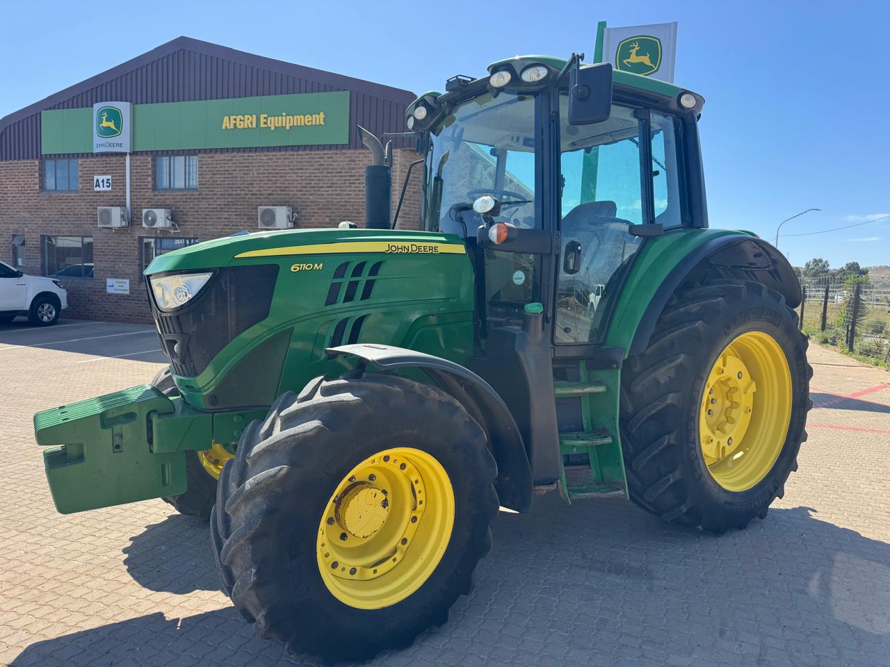 A photo of John Deere - 6110M CAB Tractor - (Vredendal)
