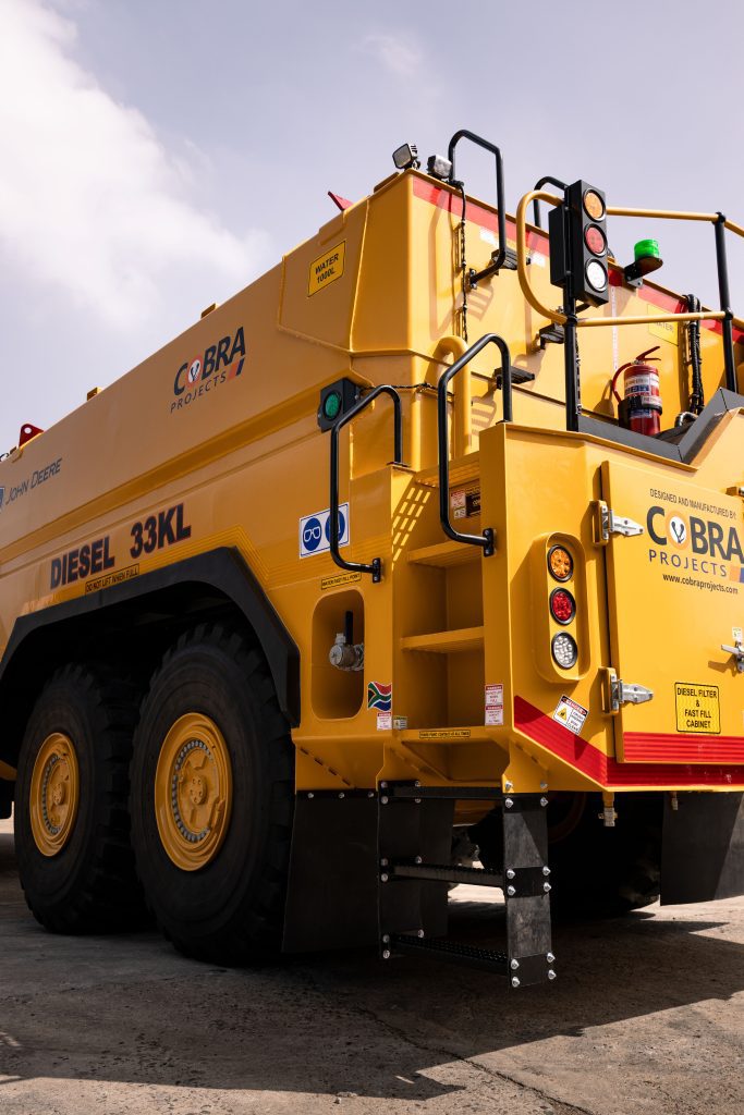 Side back view of a custom John Deere 410 P-Tier ADT