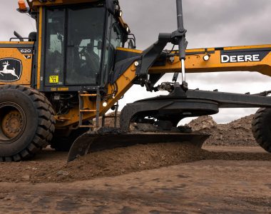 John Deere 620 P-Tier Motor Grader working on infrastructure project