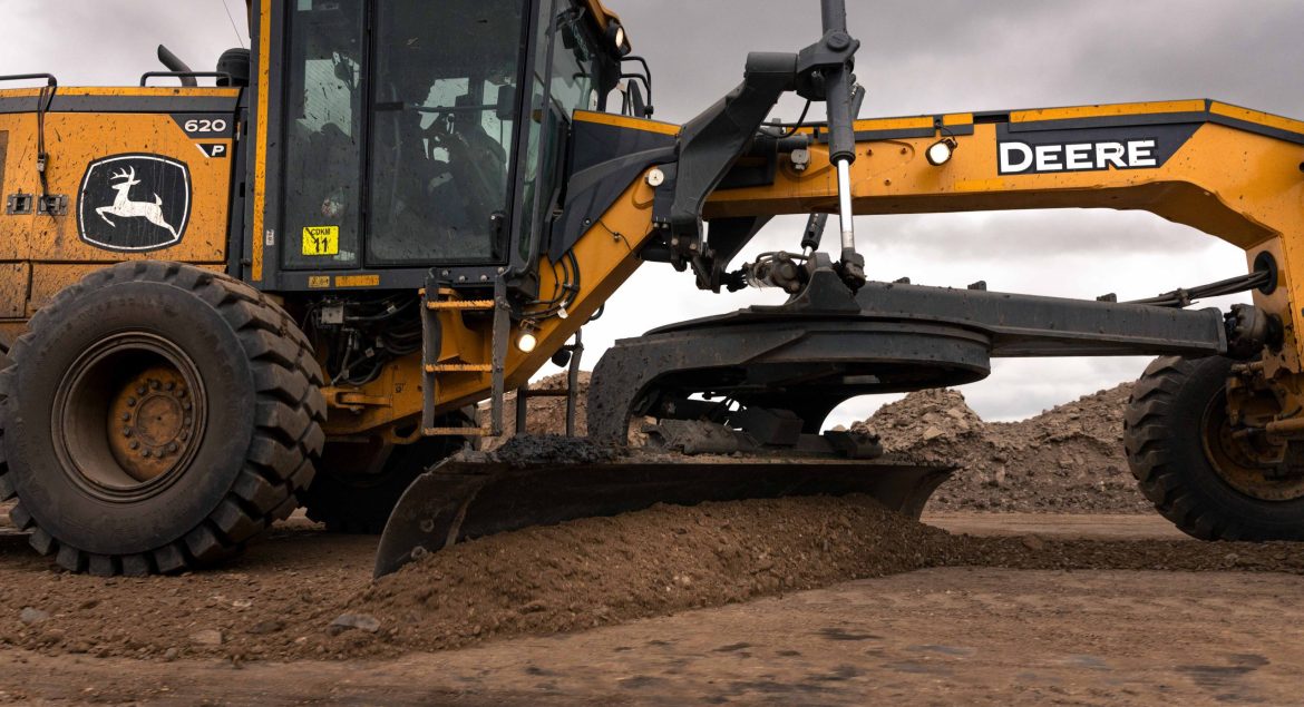 John Deere 620 P-Tier Motor Grader working on infrastructure project