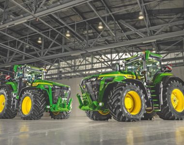 Two John Deere 8R 540 tractors as they stand in a warehouse