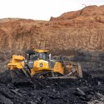 John Deere 1050 P-Tier Dozer pushing rock at Draadkar Mining operations.