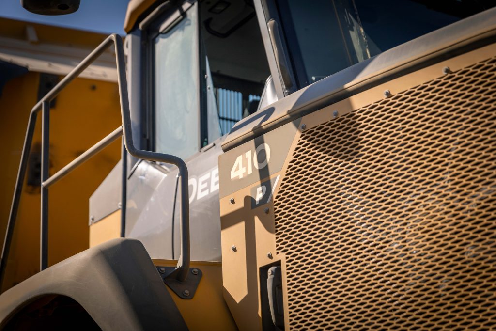 A Close-up photo of a John Deere 410 P-Tier ADT