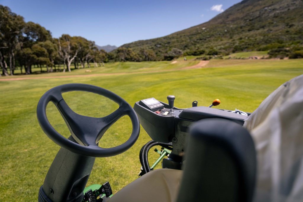 A photo of the controls of a John Deere 7200A Rough Trim and Surround Mower with John Deere TechControl™ Display