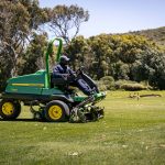 John Deere golf course mower operating on a professionally maintained golf course using TechControl™ technology.