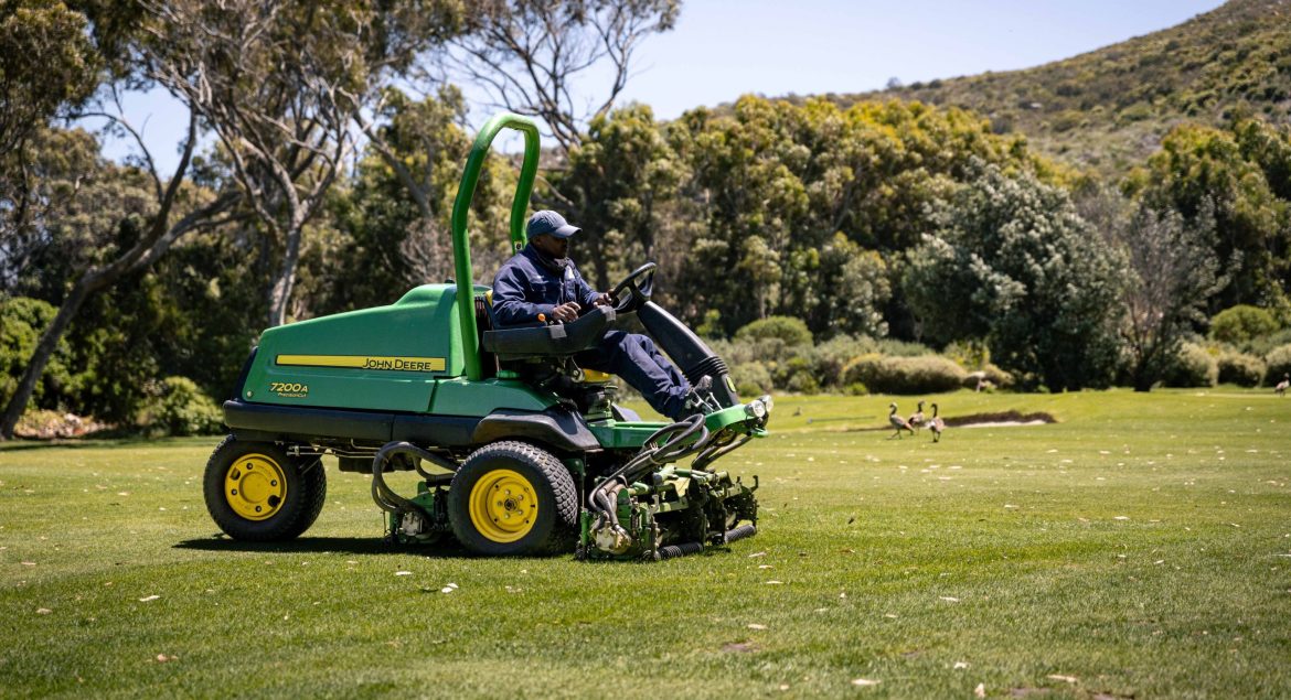 John Deere golf course mower operating on a professionally maintained golf course using TechControl™ technology.