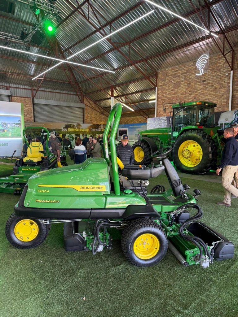 John Deere golf, turf, lawn and garden equipment displayed at NAMPO 2026 stand.